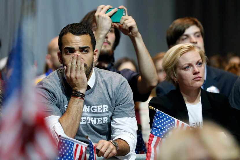 Supporters react as results come in at Hillary Clinton's election night party at the Javits...