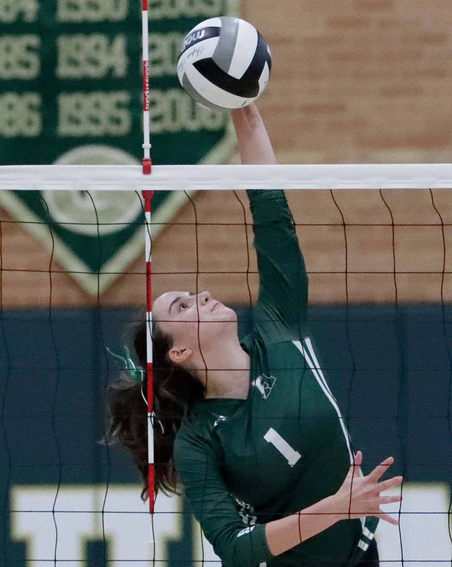 Hockaday right side Celine Ebert gets a hit during game one as Hockaday played Houston St....