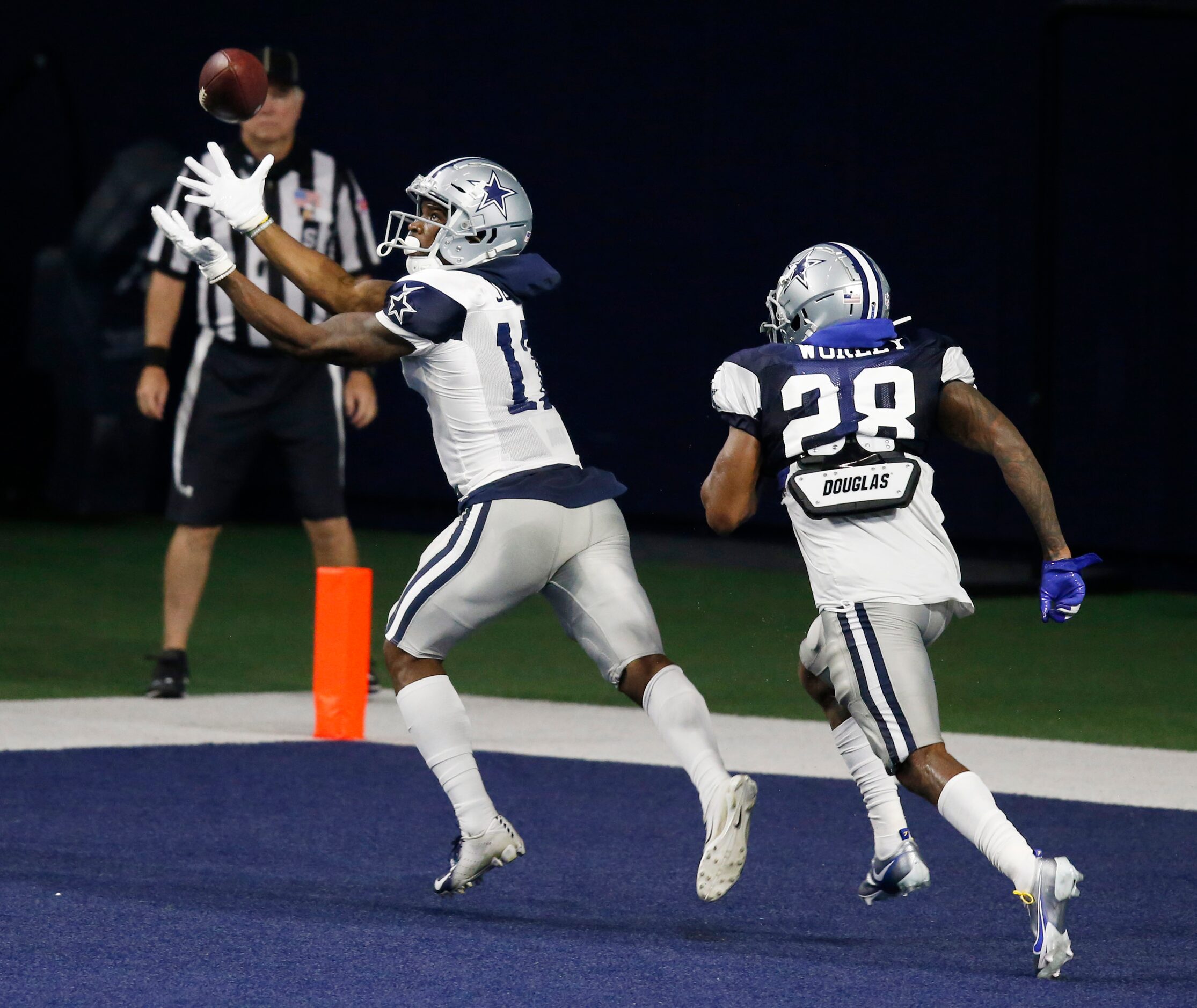 Dallas Cowboys wide receiver Cedrick Wilson (11) prepares to catch a pass in front of Dallas...