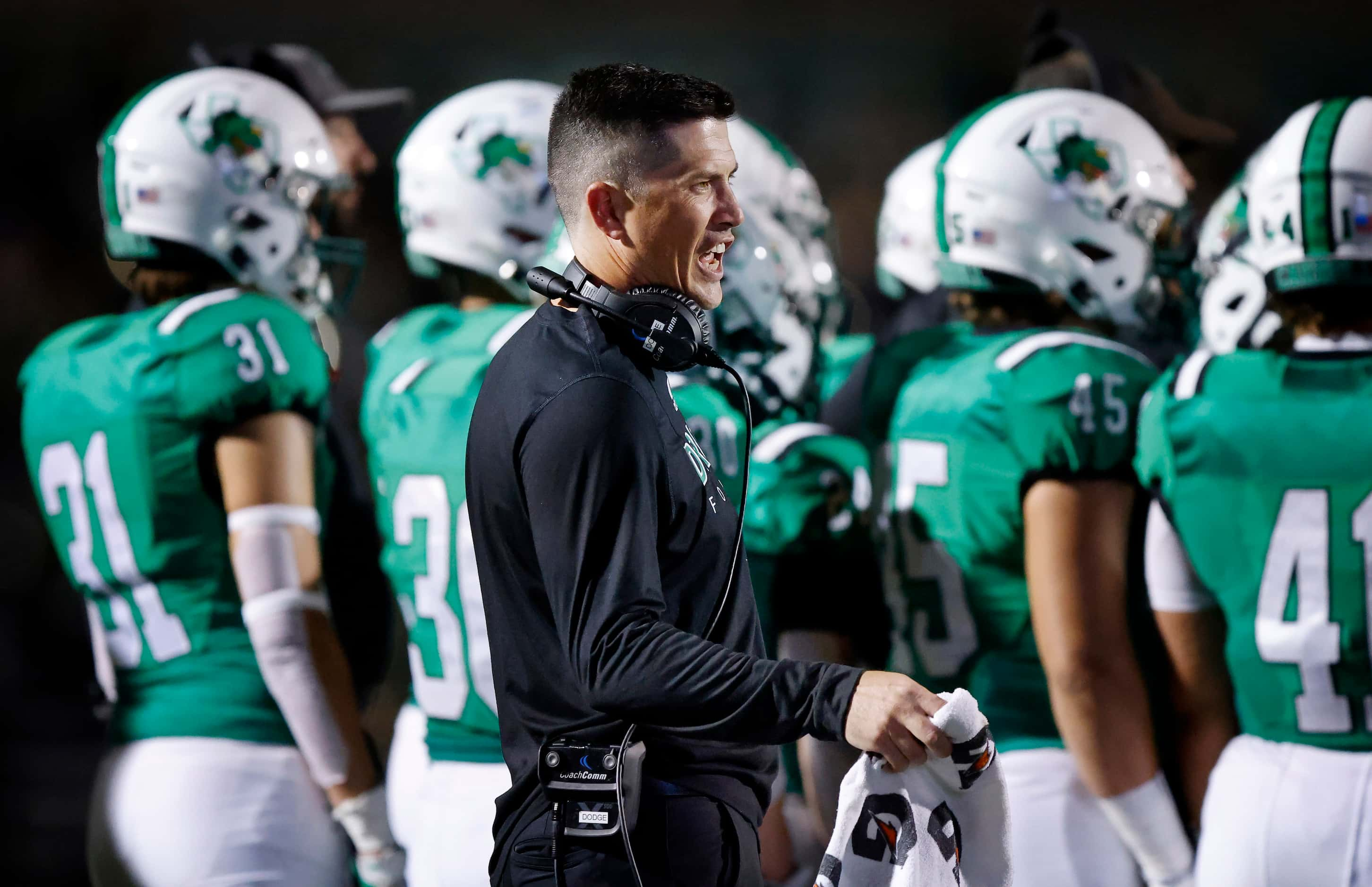 Southlake Carroll head coach Riley Dodge yells to the official as they take a timeout...