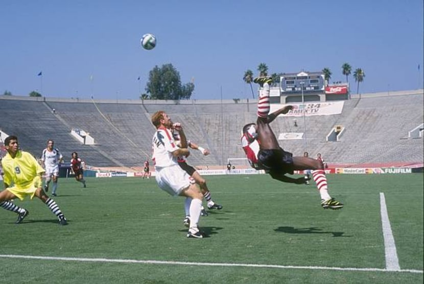 Dante Washington of the Dallas Burn tries a bicycle kick against the LA Galaxy.