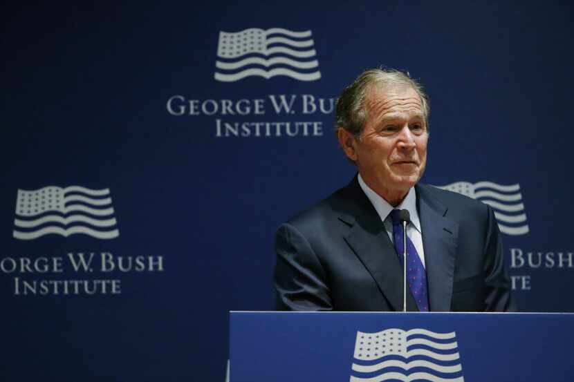 Former United States President George W. Bush makes comments during the graduation ceremony...