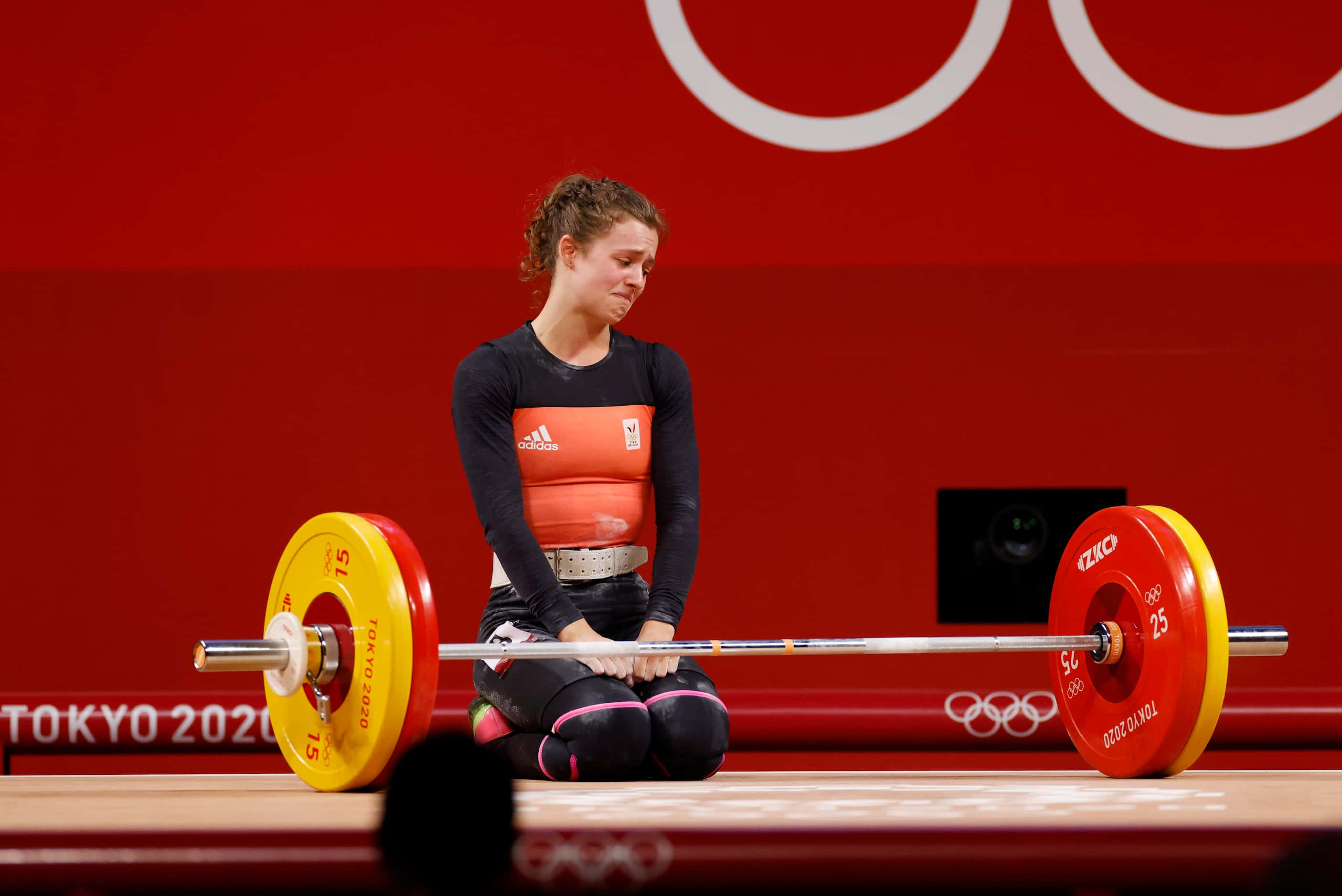 Belgium’s Nina Sterckx dejected after an unsuccessful third attempt in the clean and jerk...