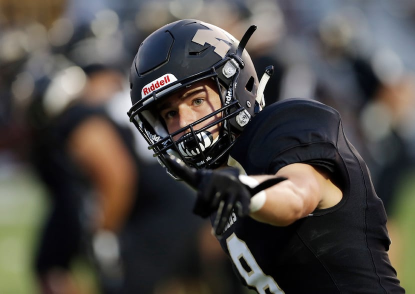 TXHSFB Mansfield senior wide receiver Jackson Gleeson (8) lines up during the first half of...