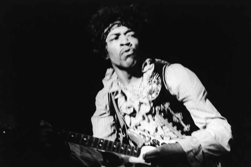 American rock guitarist Jimi Hendrix performing with The Jimi Hendrix Experience at the...