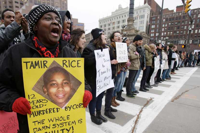 Demonstrators block Public Square in Cleveland, during a protest over the police shooting of...