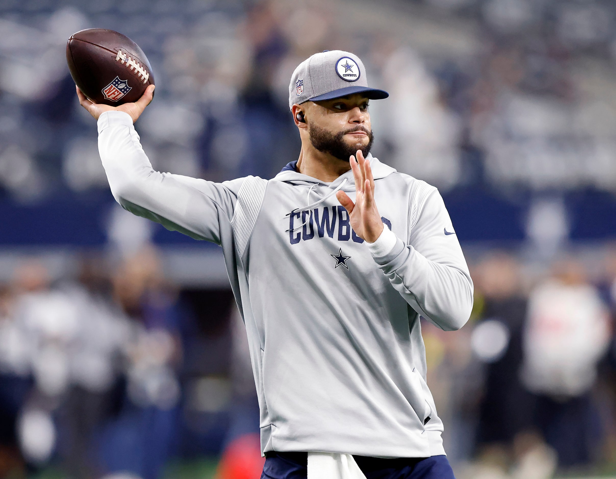 Dallas Cowboys quarterback Dak Prescott (4) throws during pregame warmups before facing the...