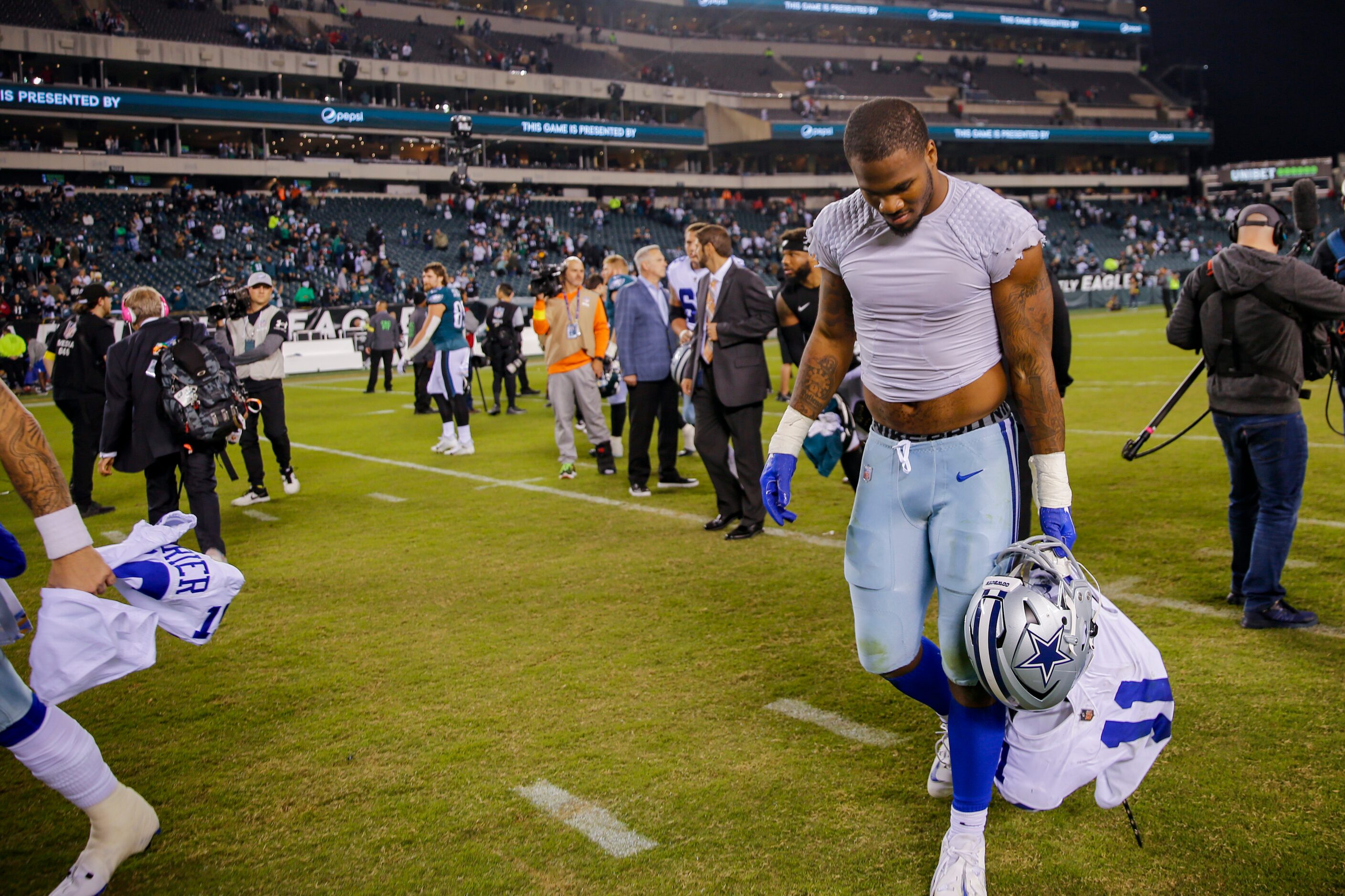 Dallas Cowboys linebacker Micah Parsons (11) walks off the field following a loss against...