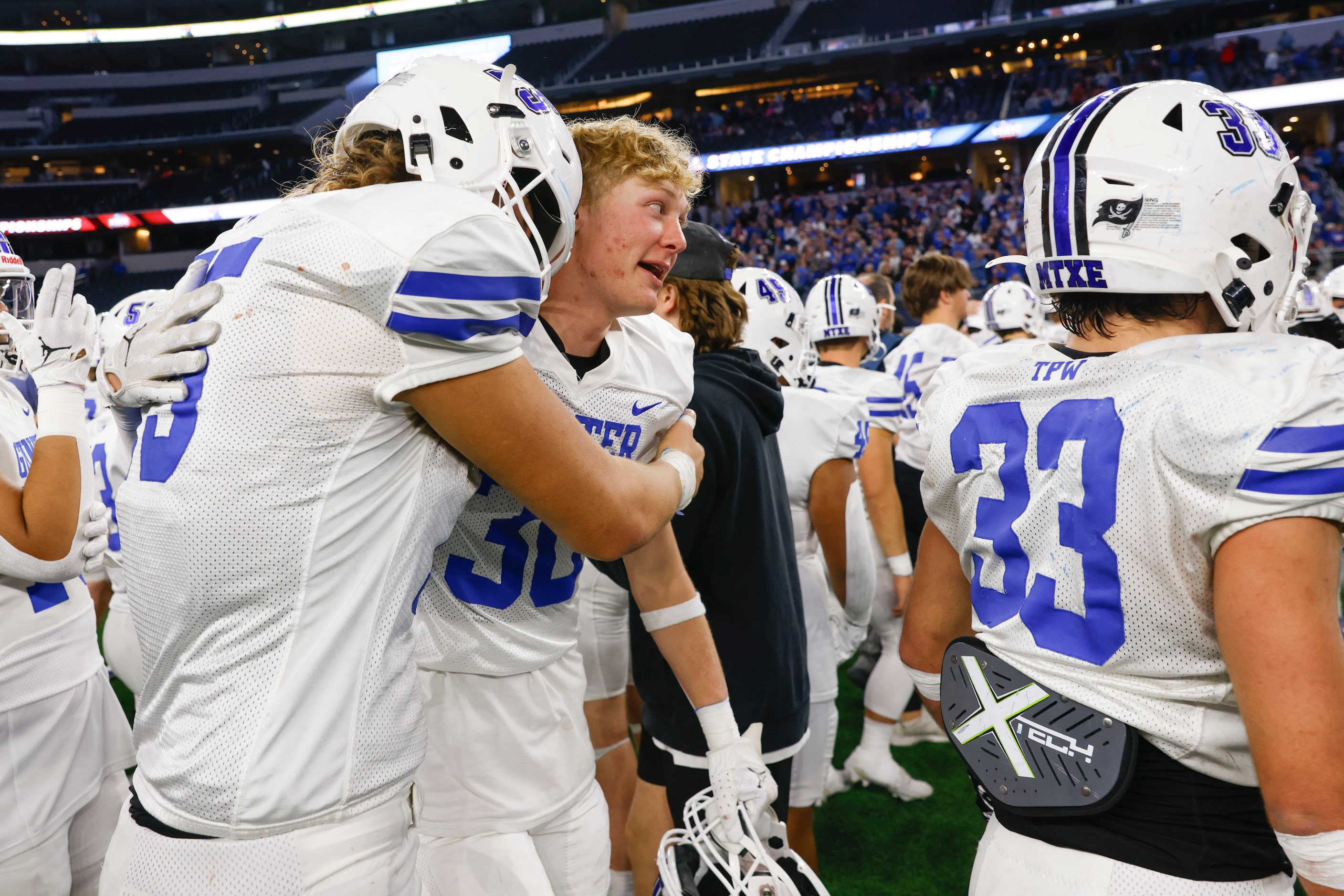 Gunter High players celebrate after winning the Class 3A Division II state championship game...