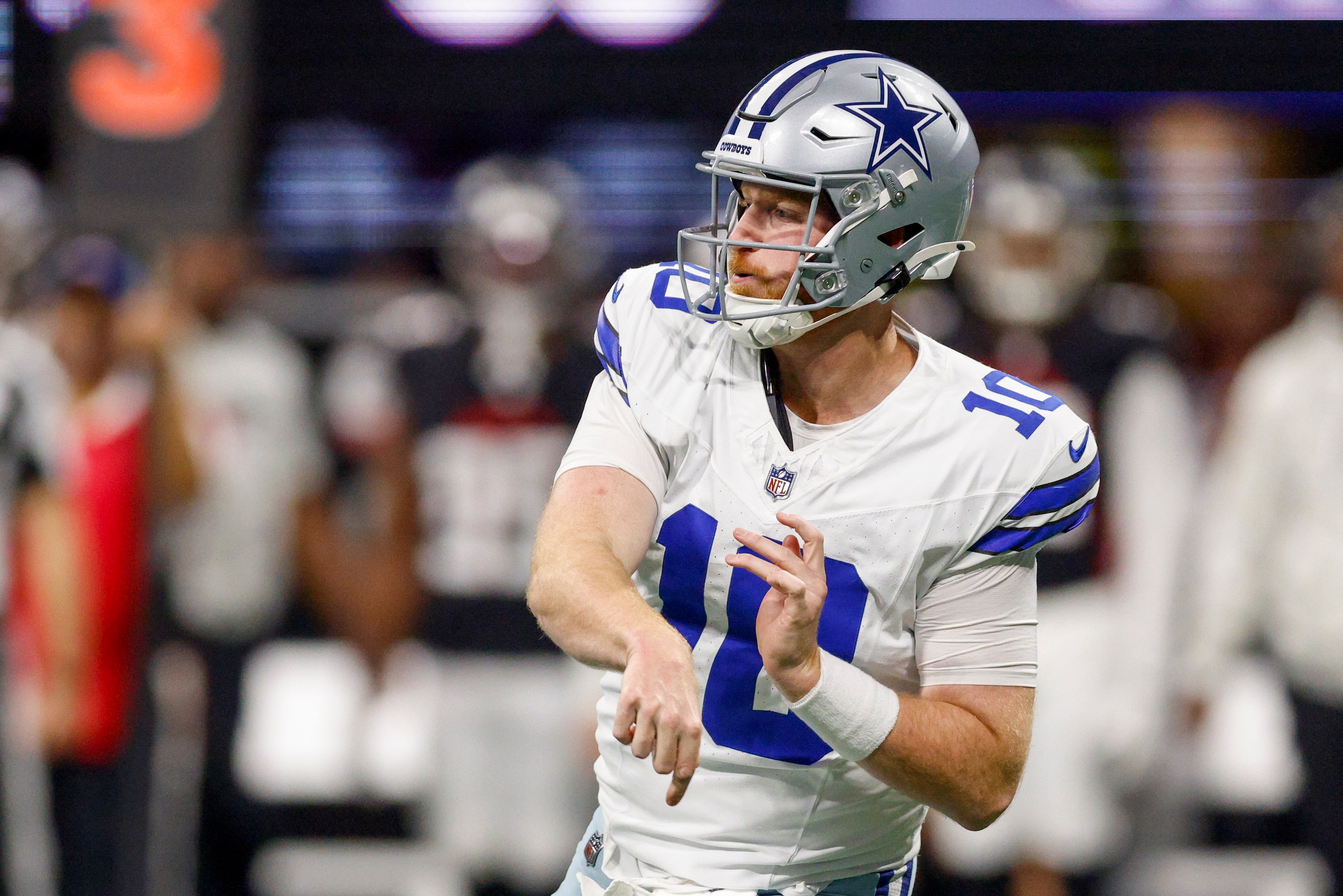 Dallas Cowboys quarterback Cooper Rush (10) throws a pass down the field during the second...