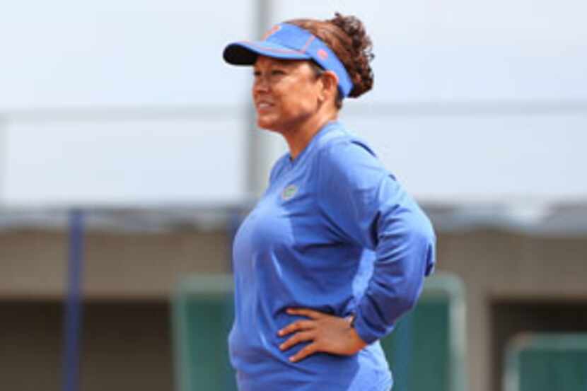 Florida assistant coach Jennifer Rocha watches a practice drill during the Gators' practice...