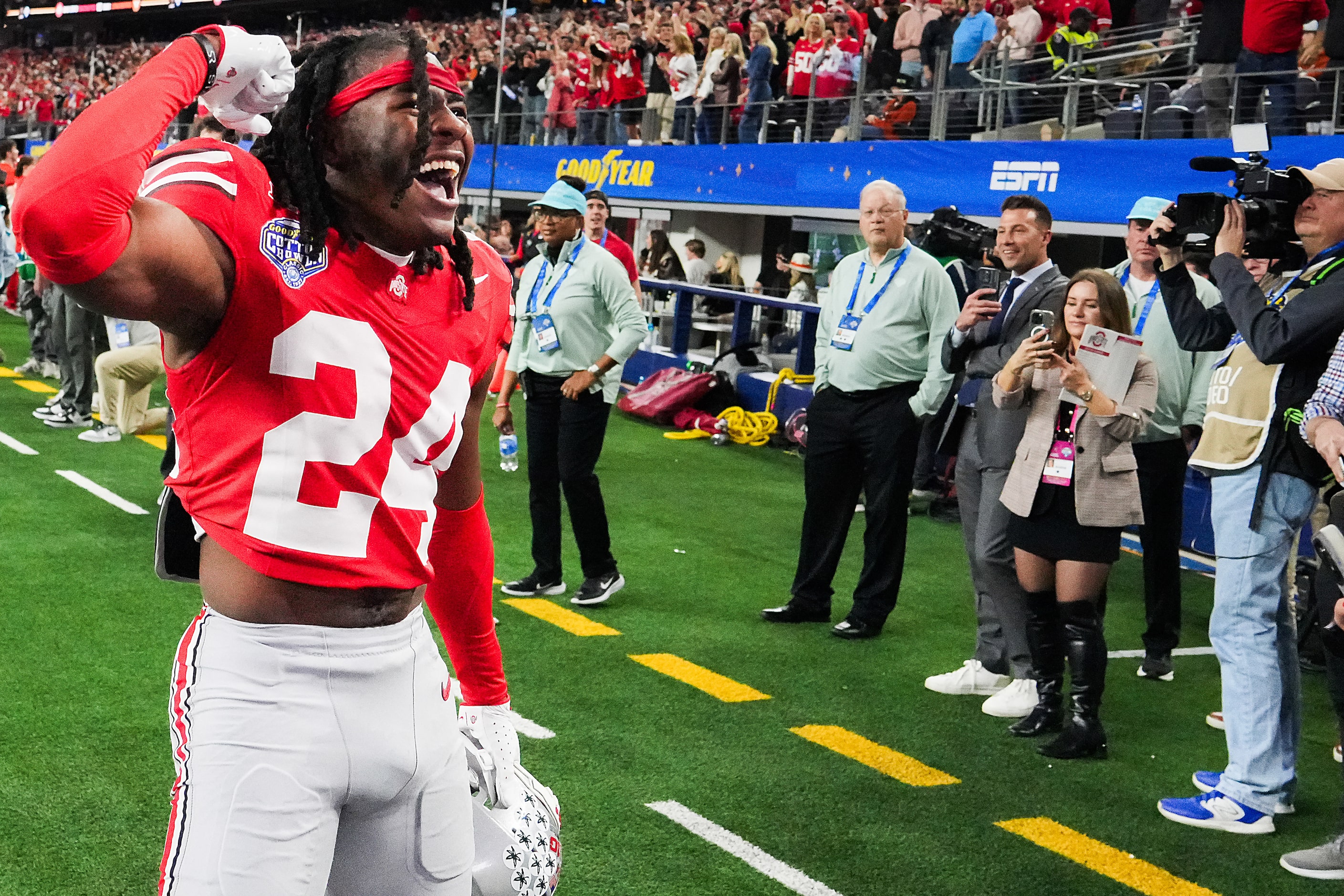 Ohio State cornerback Jermaine Mathews Jr. (24) celebrates after safety Caleb Downs after...