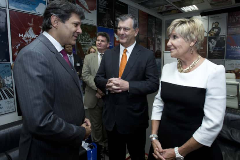 São Paulo Mayor Fernando Haddad (left) chatted with Dallas Mayor Mike Rawlings and Fort...