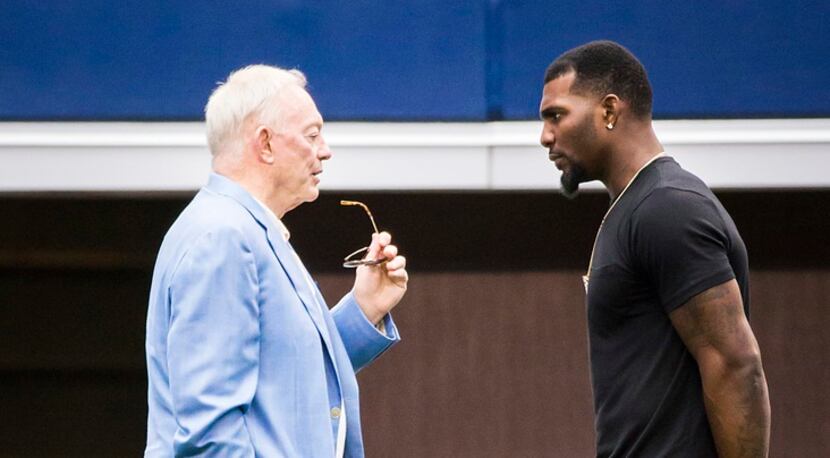 Dallas Cowboys wide receiver Dez Bryant (right) talks with team owner Jerry Jones on the...