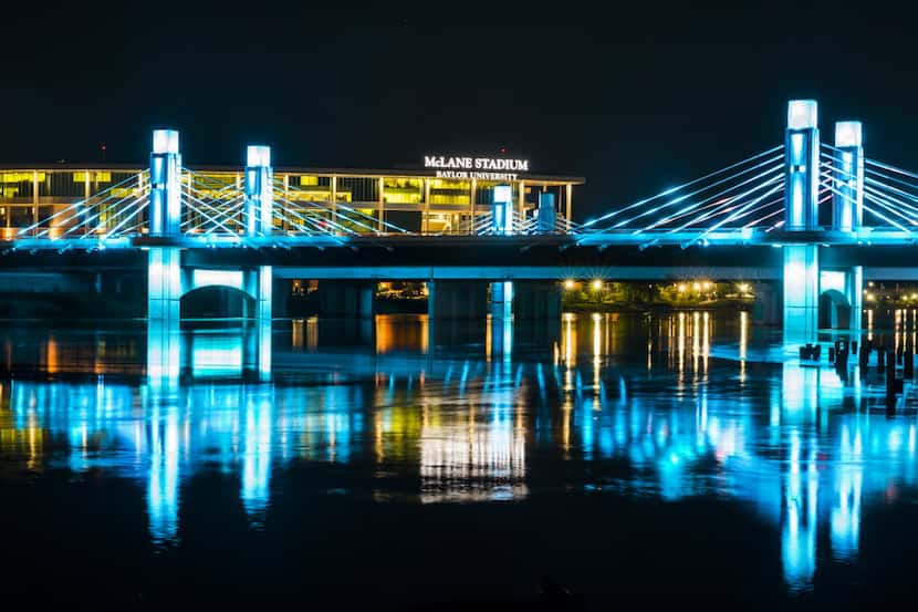 McLane Stadium, the home of Baylor University football, is seen behind I-35 bridges across...
