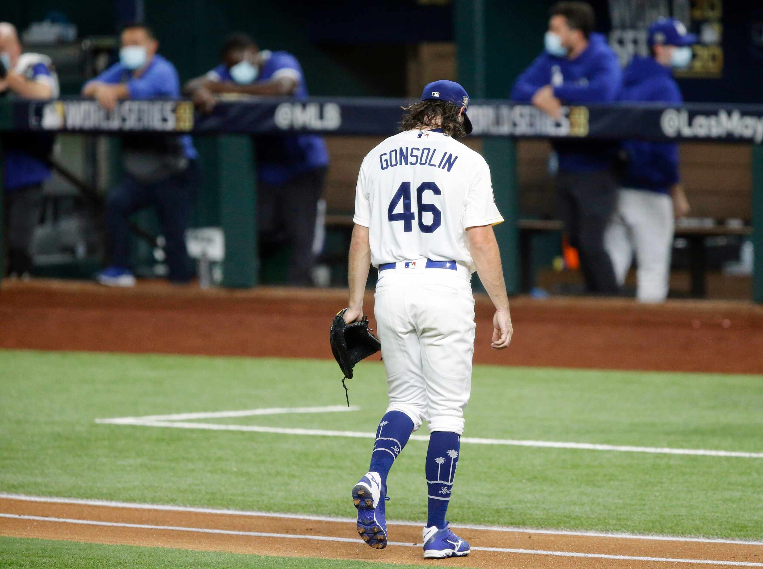 Los Angeles Dodgers starting pitcher Tony Gonsolin (46) exits the game after being pulled...