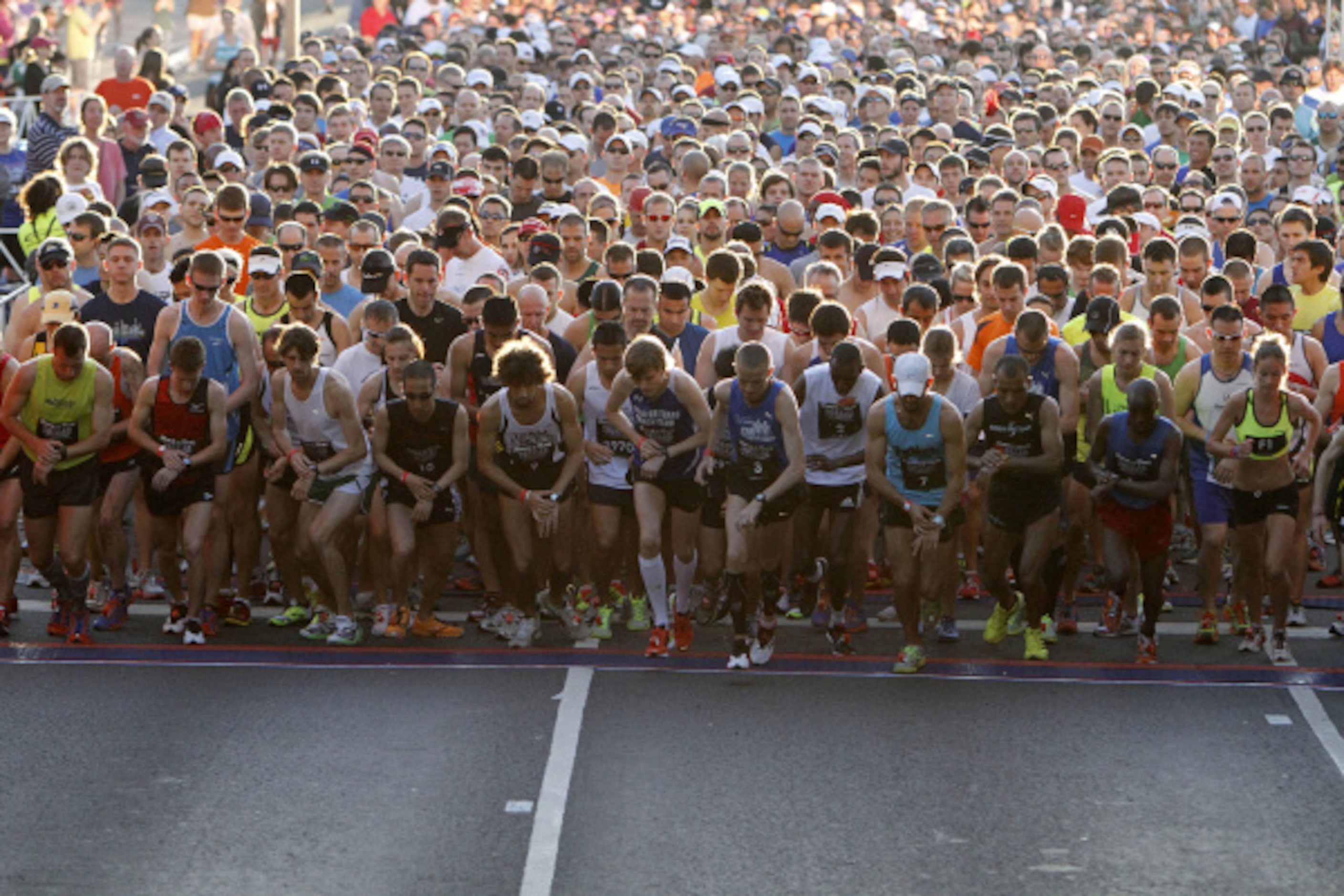 Dallas Rock 'N' Roll runners begin the half marathon in front of city hall on Sunday, March...