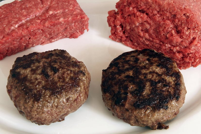A burger made from what the meat industry calls "lean, finely textured beef" (right) and one...