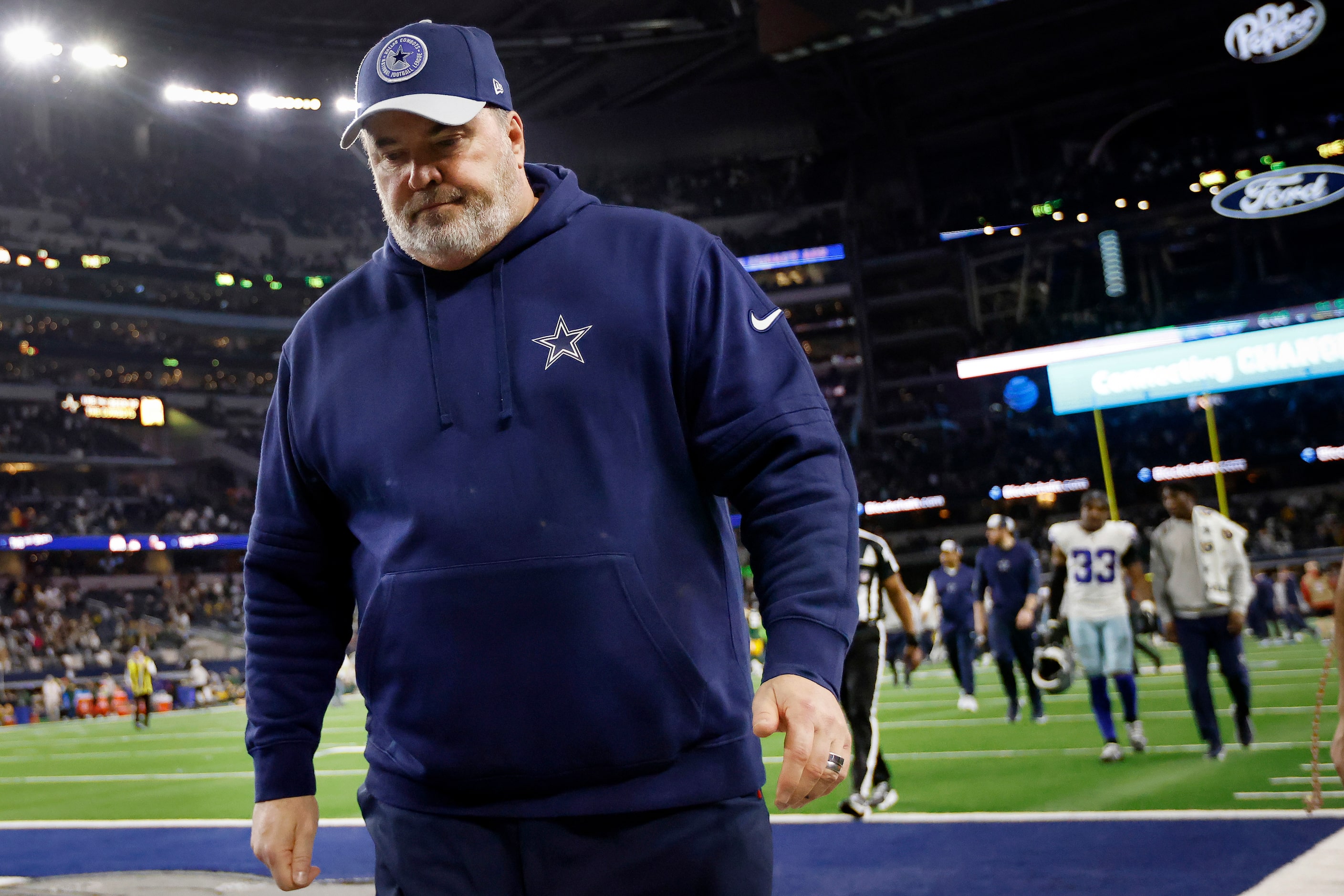 Dallas Cowboys head coach Mike McCarthy leaves the field following their Wild Card Playoff...