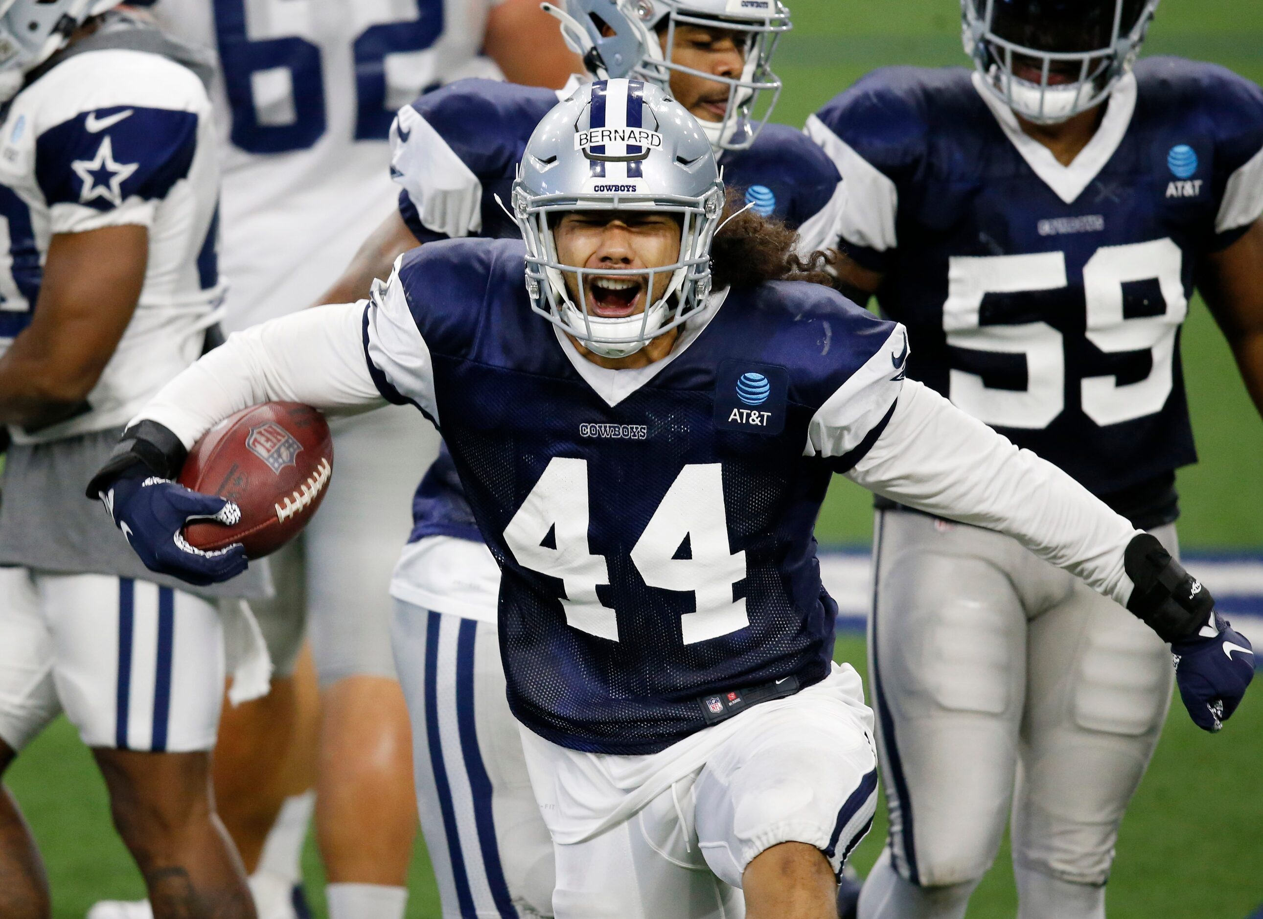 Dallas Cowboys linebacker Francis Bernard (44) celebrates after intercepting a pass during...