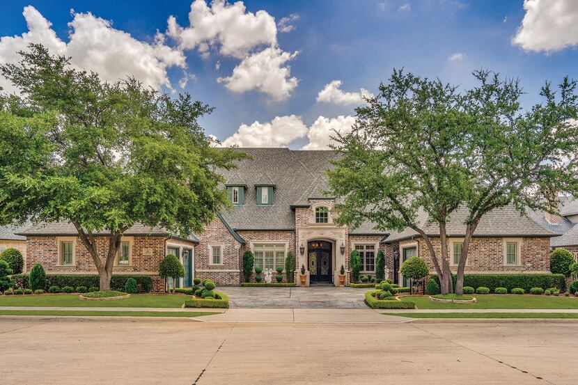 The Bob Bobbitt custom estate at 49 Armstrong Drive in Frisco is situated in the Villages of...
