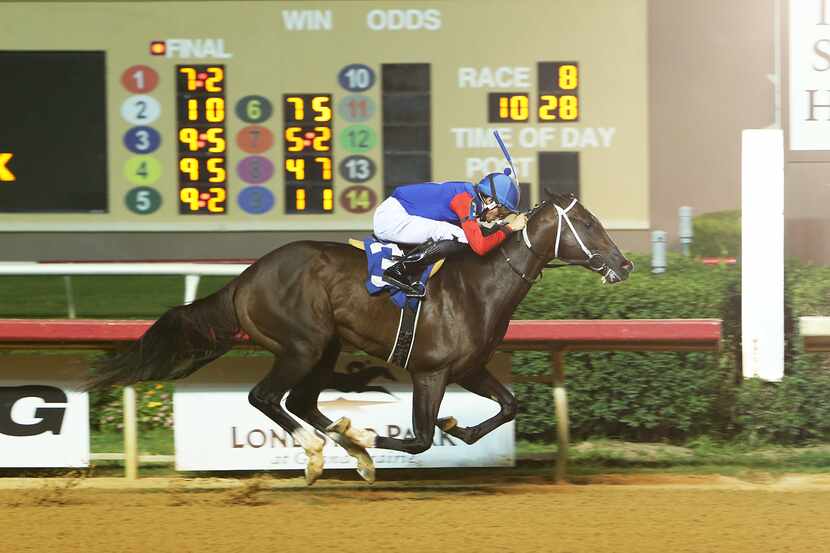 Keith James Asmussen rides Super Stock to his maiden victory in the $114,000 Texas...
