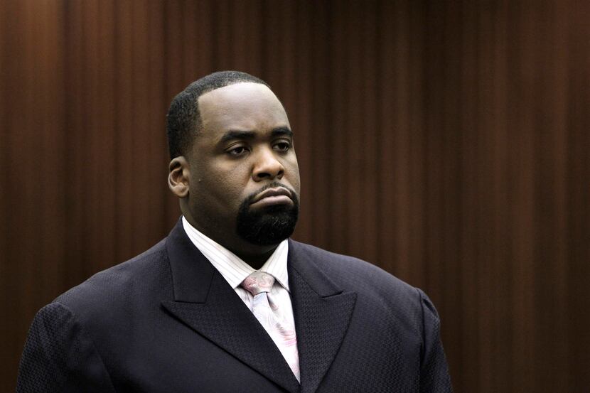 FILE - In this May 25, 2010 file photo, former Detroit Mayor Kwame Kilpatrick listens to...
