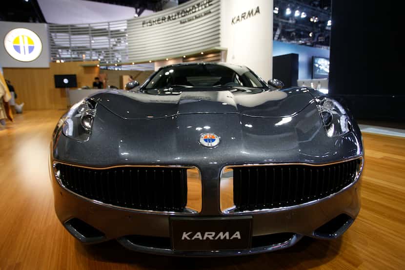 FILE - Fisker Automotive's Fisker Karma, a sports luxury plug-in hybrid car, is displayed at...