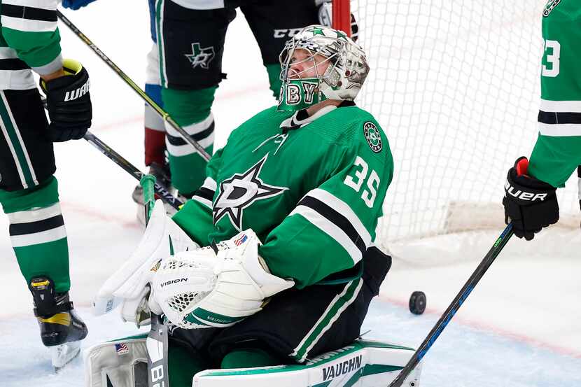Dallas Stars goaltender Anton Khudobin (35) reacts after being scored on by the Colorado...