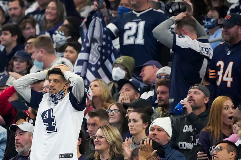 Dallas Cowboys react after kicker Greg Zuerlein missed a field goal during the first half of...