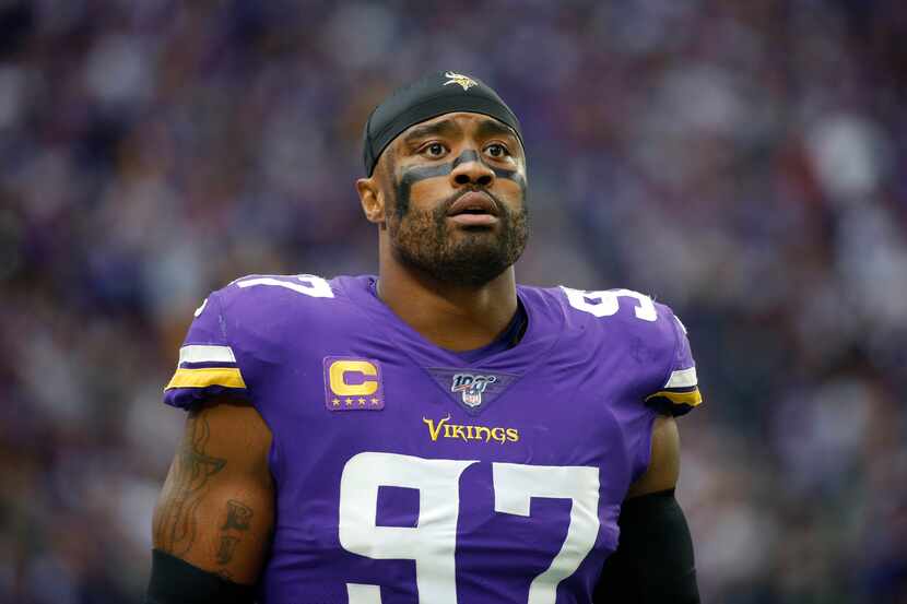 In this Sept. 22, 2019 file photo, Minnesota Vikings defensive end Everson Griffen stands on...