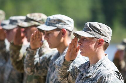 First Lt. Shaye Haver (right) of Copperas Cove in Central Texas saluted during her...