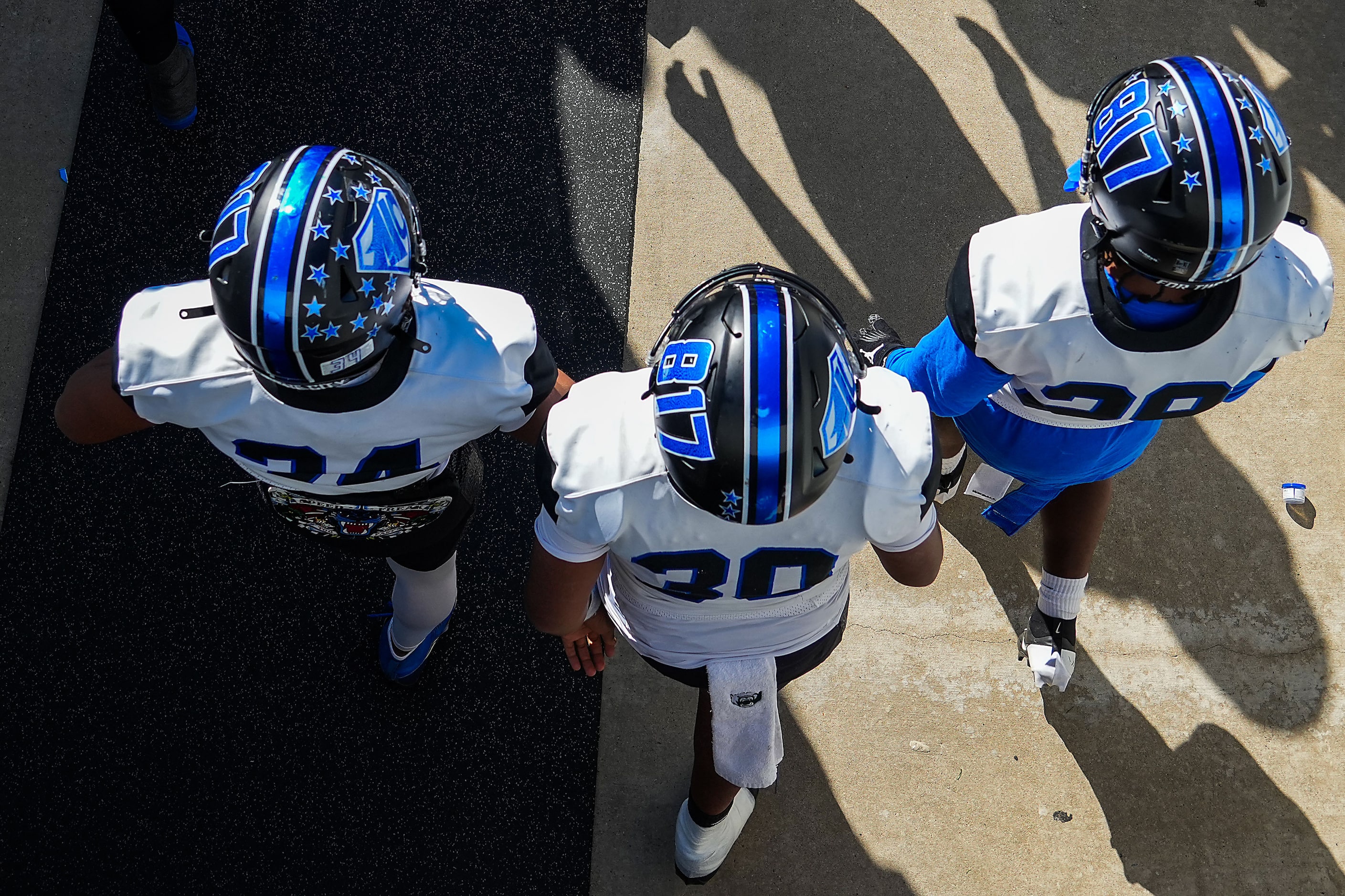 North Crowley players take the field for the first half of a UIL Class 6A Division I Region...