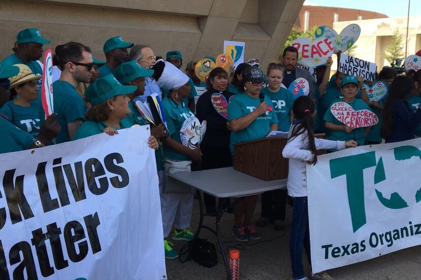 Maria Victoria de la Cruz, a Texas Organizing Project leader from San Antonio, cried while...