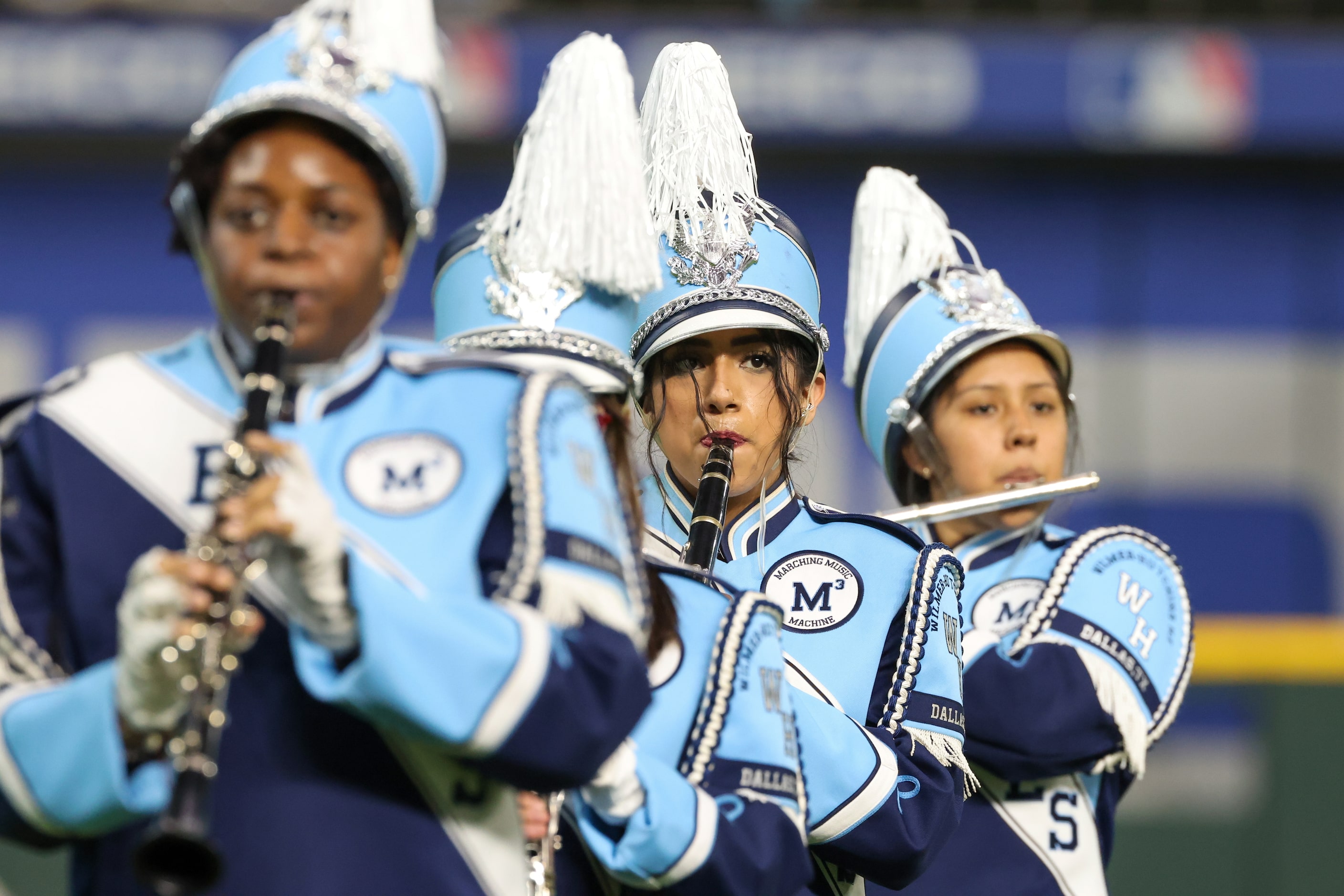 Members of Wilmer-Hutchins High School marching band perform at the Roland Parrish Battle of...