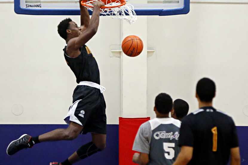 South Grand Prairie's Cameron McGriff, shown dunking for his select team this summer, signed...