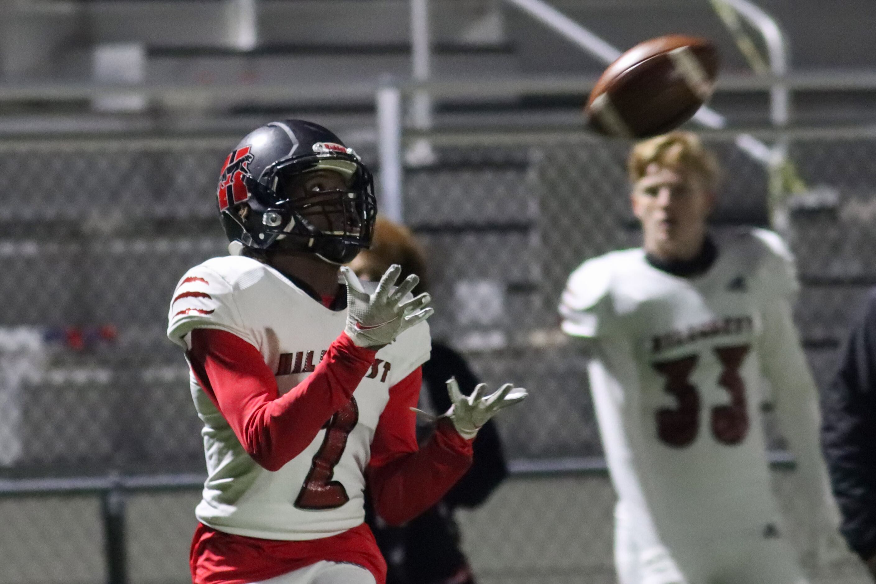 Hillcrest wide receiver Tmawn Lattimore (2) catches a touchdown pass during the first half...