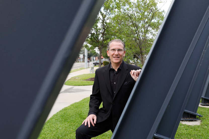 Michael Ablon, principal of PegasusAblon, alongside the George Tobolowsky sculpture in the...