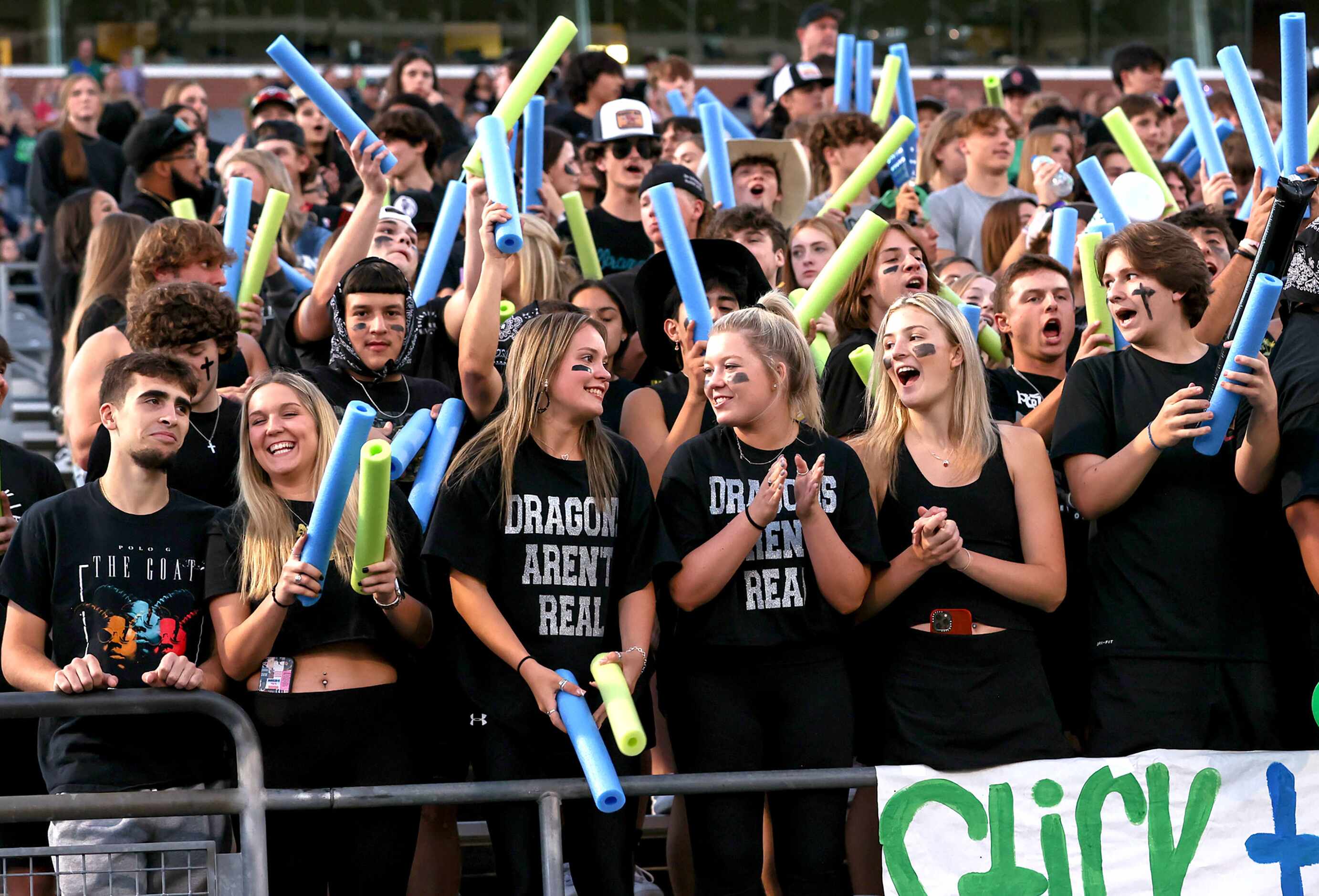 The Eaton Eagles students cheer on their team against Southlake Carroll in a District 4-6A...