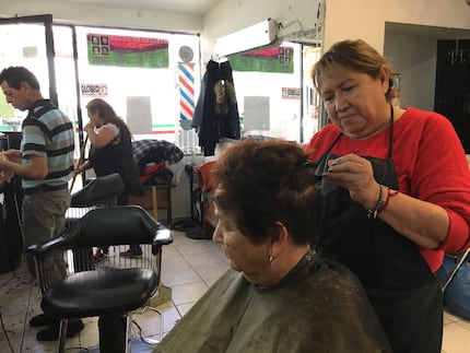 Maria Elena Gonzalez works in the beauty shop she owns in Nogales, Mexico She and other...