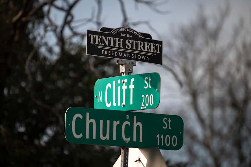 Street signage marks the Tenth Street Historic District, which is listed as one of the most...