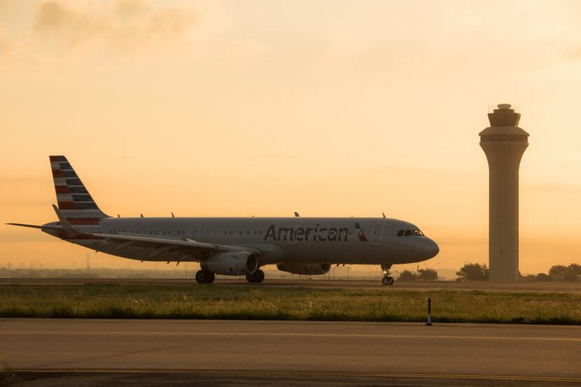 An American Airlines jet prepares to take off from D/FW International Airport.
