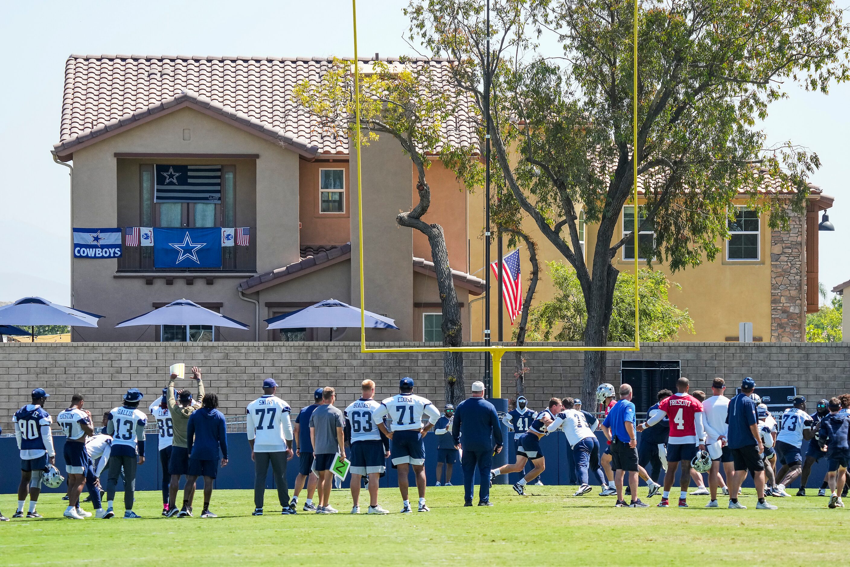 Dallas Cowboys players participate in a training camp walk-through on Friday, Aug. 4, 2023,...