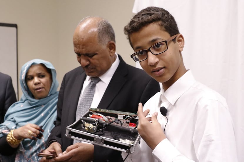 Ahmed Mohamed, with his parents, Muna Ibrahim and Mohamed Elhassan Mohamed, shows the clock...
