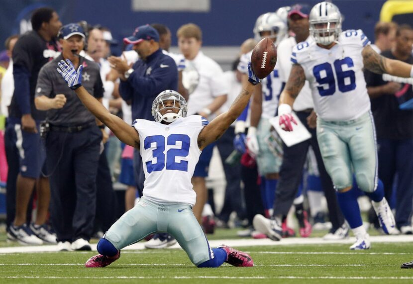 Dallas Cowboys cornerback Orlando Scandrick (32) celebrates after getting an interception in...