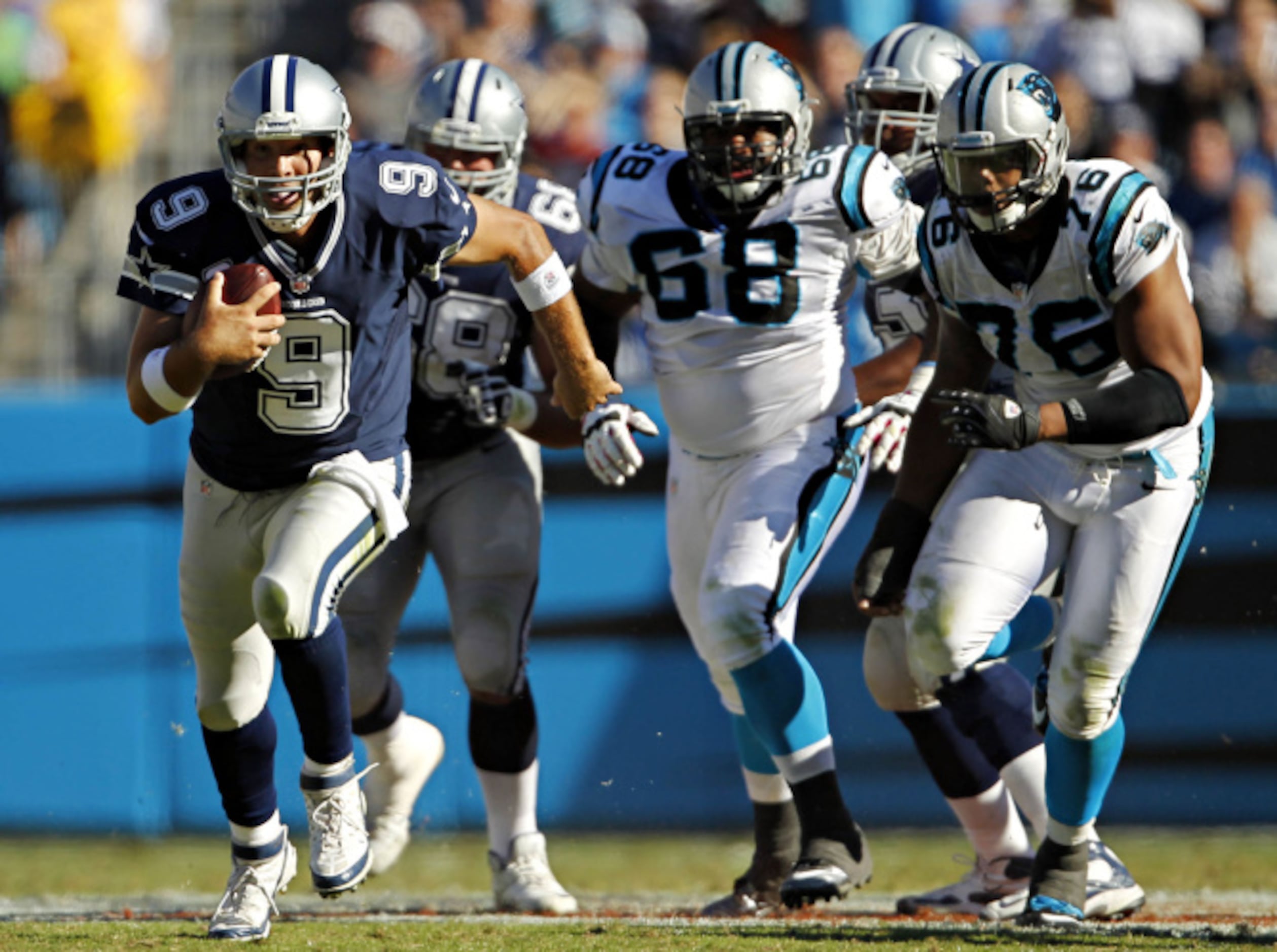 Dallas Cowboys' Jason Hatcher (97) walks off the field during the second  half of an NFL