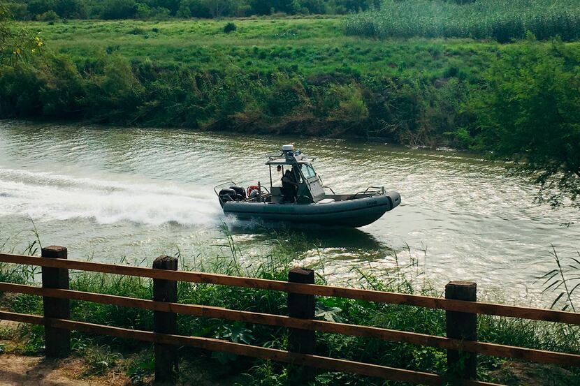A U.S. Border Patrol boat navigates the Rio Grande River. Agents patrolling near Fronton,...