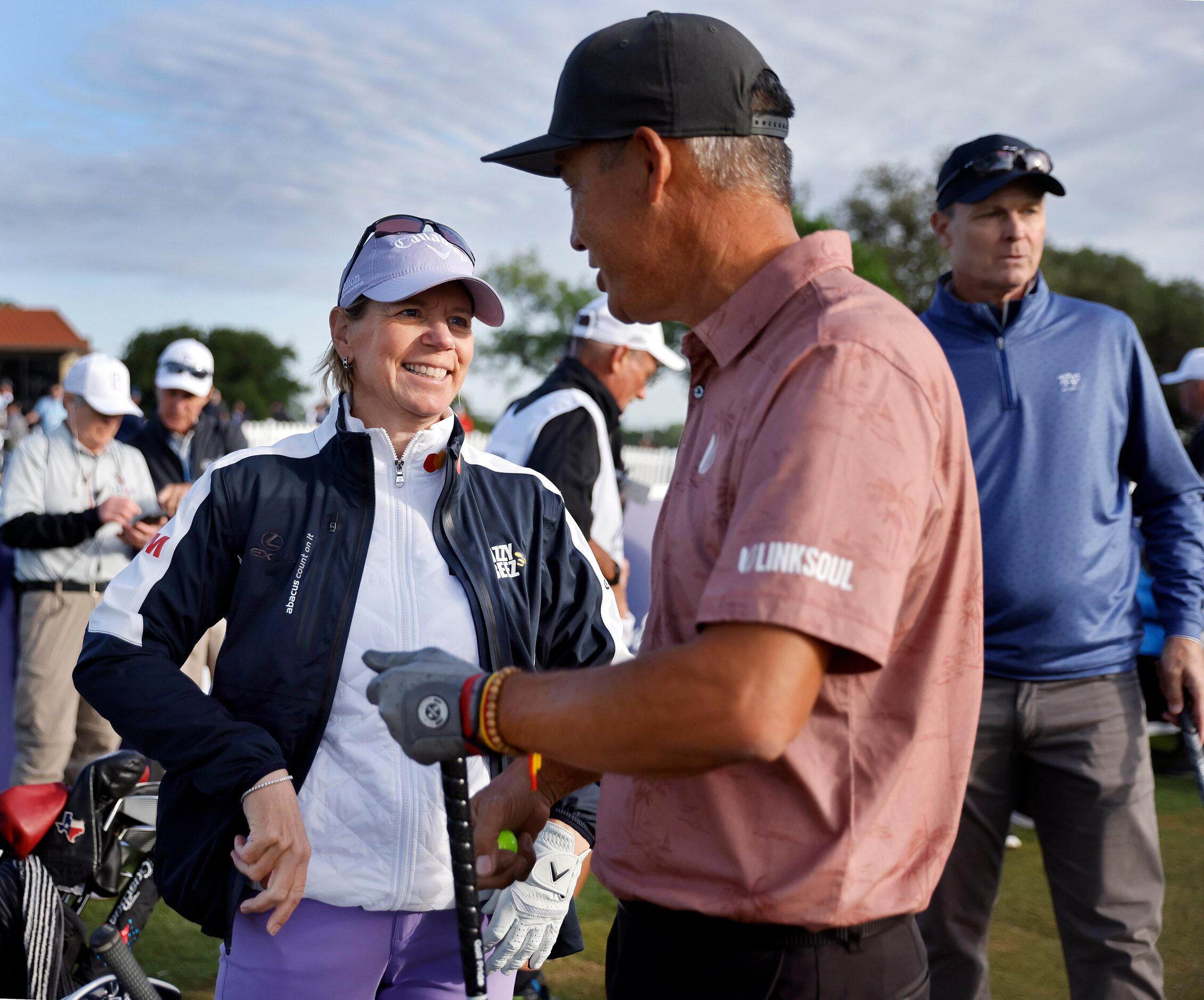 Retired LPGA golfer Annika Sorenstam (left) visits with playing partner Dean Wilson before...