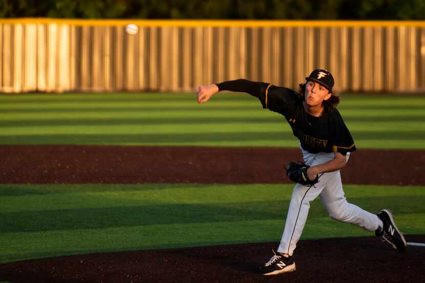 Forney pitcher Aiden Sims (4) delivers a pitch during a baseball game between Crandall High...