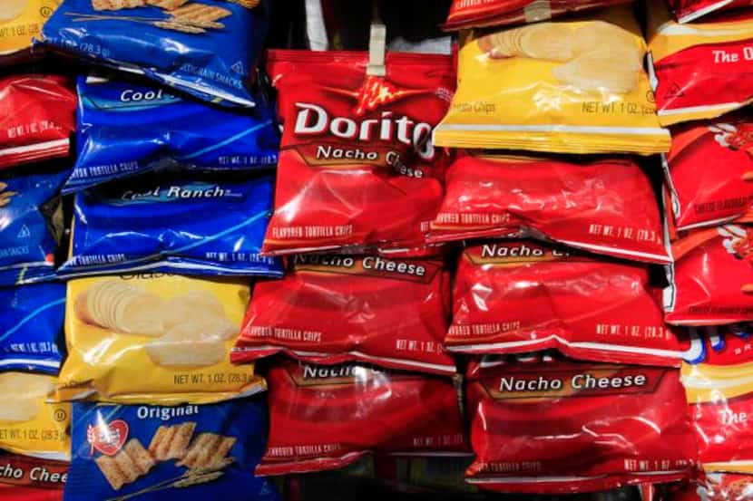 Frito-Lay snacks, including Doritos chips, are expected to help lead the way in overtaking...